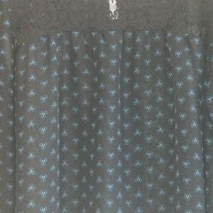 Two beautiful dresses one beautiful blouse and two beautiful skirts.